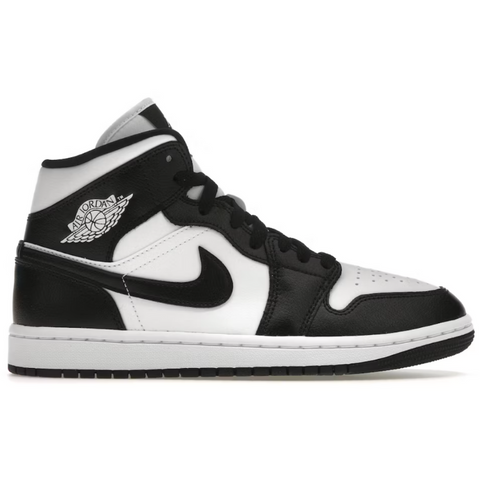 Jordan 1 Mid Panda en blanco y negro, diseñados para baloncesto, con suela de goma y unidad Air Sole para amortiguación y tracción.