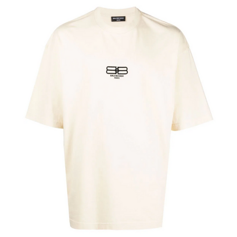 Camisa exclusiva Balenciaga Oversized de color crema con el logo centrado en el pecho